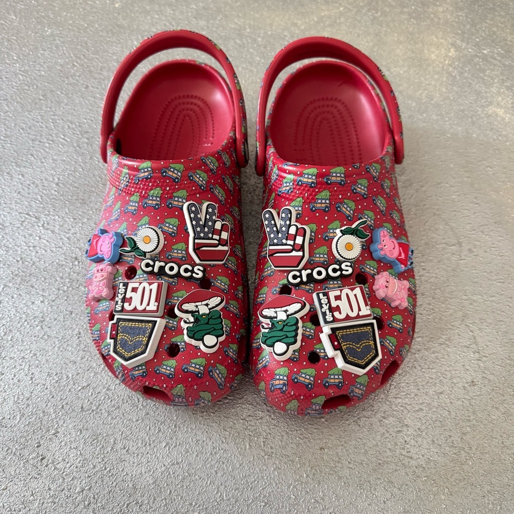 CROCS Red Patterned Clogs with Fun Badges